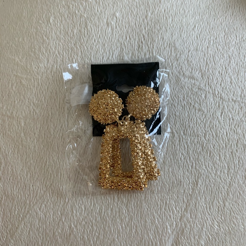 Gold statement earrings